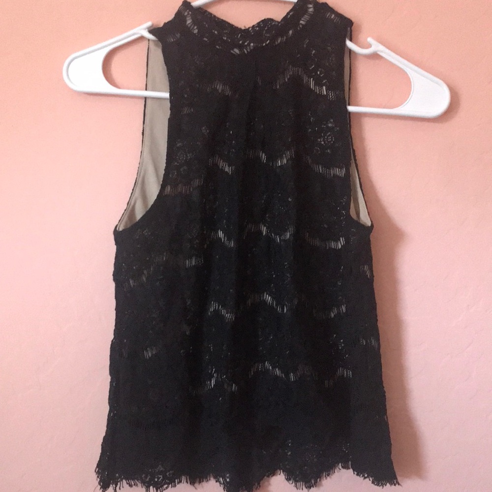Black shirt with small open on back
